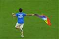 Qatar pitch invader who carried rainbow flag says he will not face legal action