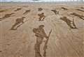 Kent beach adorned with silhouettes of soldiers for 80th D-Day anniversary