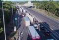 Woman flown to hospital and man arrested following crash on M20