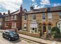 Fireplaces and bay window at house for sale