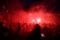 Liverpool fans gather outside Anfield to celebrate title win despite warnings