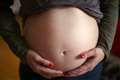 Pregnant women face confusion and delays as they try to get Covid jab – charity