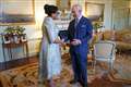 King gives cheery greeting to Baroness Scotland during Palace audience