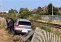 Car crashes into railway fence