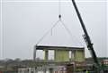 New school building lifted into place