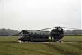 Chinook stuck in muddy field after precautionary landing