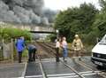 Rail line re-opens after warehouse inferno