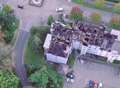 Aerial views reveal damage after horror blaze