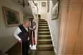 Prince of Wales congratulates 90-year-old raising money by climbing staircase