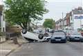 Man stabbed following crash which leaves car on its roof