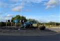 Smashed-up car abandoned on roundabout for more than two weeks