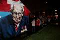 Belfast residents gather by mural portrait to applaud Captain Sir Tom Moore