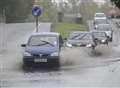 Kent on flood alert after heavy downpours