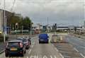 Pedestrian taken to hospital after being hit by car near shopping centre