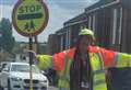 Lollipop lady lucky to be alive after collapsing outside school