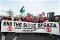 Protesters hold up mock body bags in protest at Gaza war