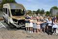 Teachers to replace torched school minibus 