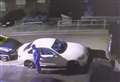 VIDEO: Boiler-suited man breaks into BMW