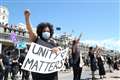 Black Lives Matter protesters form mile-long line along Brighton seafront