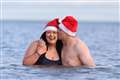 Couple who met at Helen’s Bay charity swim return for another festive dip