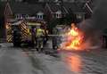 Firefighters tackle taxi blaze