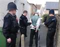 Four held after police street searches