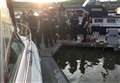 Boatman dragged bridge fall woman to safety