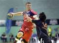 Heavy defeat ends GB handball challenge