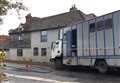 Horsebox crashes into historic pub