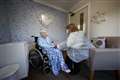 Johnson appeals for caution over care home visits