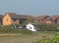 Air ambulance lands in field