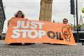 Just Stop Oil protesters glue themselves to roads around Trafalgar Square