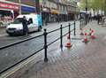 Engineers fixing high street leak