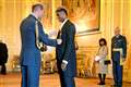 Rashford dedicates MBE to mother and vows to continue campaign to feed children