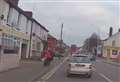 Reckless biker nearly hits pedestrian 