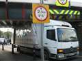 Driver's error as lorry is wedged under bridge