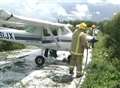 Two hurt as light aircraft overshoots runway