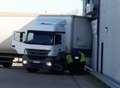 Lorry in tight squeeze at business park