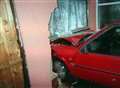 Car ploughs through pensioner's window