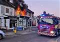 Man charged after fire engulfs shop