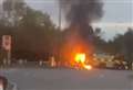 Car bursts into flames on busy roundabout