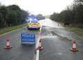 Flooded roads remain closed