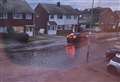 Street flooded as burst main leaves commercial units without water