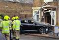 Man charged after car smashes into house