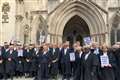 Striking barristers resume demonstrations amid talks with ministers over pay