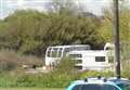 Travellers leave seaside car park