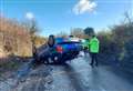 Lucky escape for driver as car flips on icy road