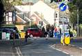 Woman taken to hospital after ‘loud’ motorbike crash blocks busy road