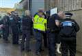 Three arrests after police raid at meat factory