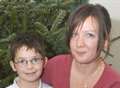 'Hero' son saves mum electrocuted by tree lights